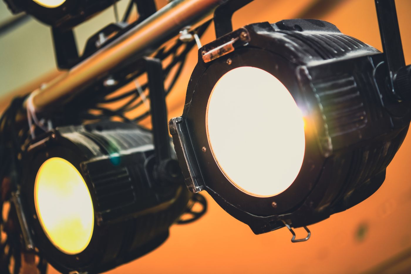 Two compact warm spotlights; illustrative photography